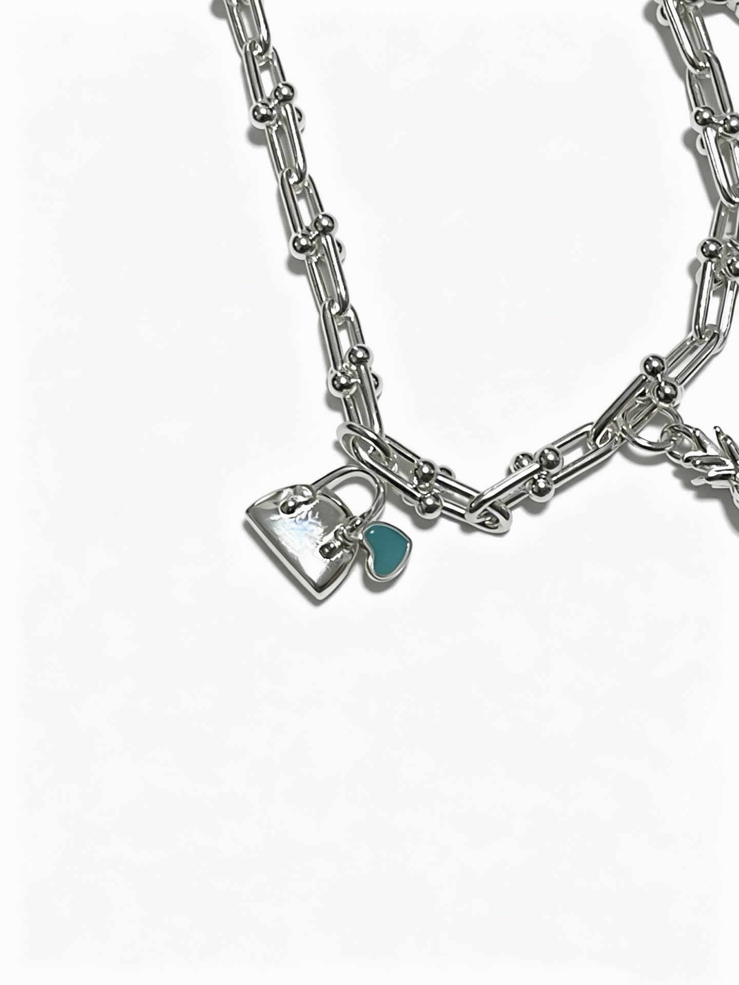 Tiffany & Co. Silver Charm Necklace